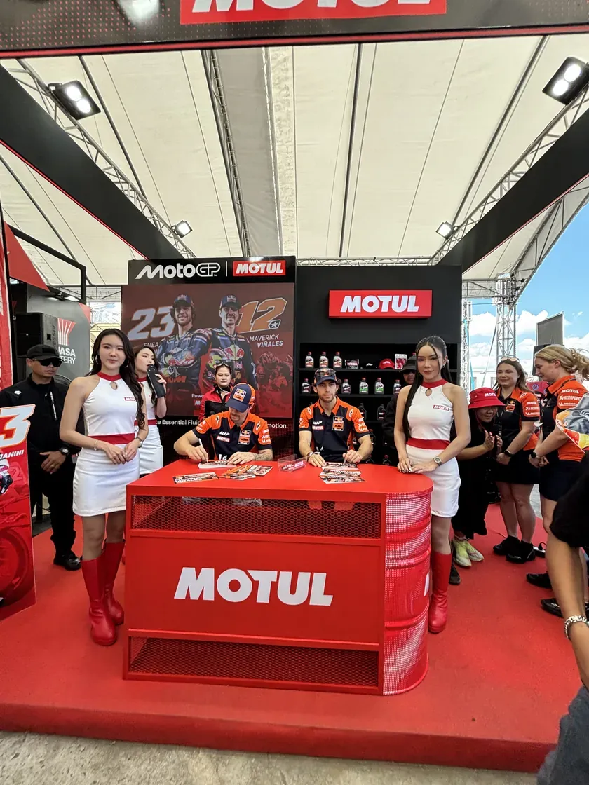 Fans meeting riders at a Motul signing session